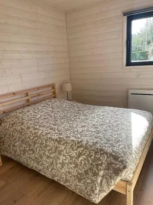 Un ou plusieurs lits dans un hébergement de l'établissement Chalet - Cottage de Lesconil