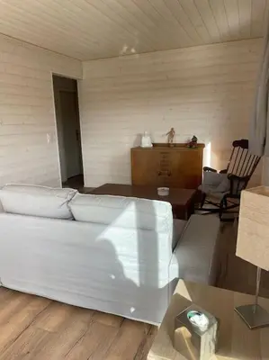 Coin salon dans l'établissement Chalet - Cottage de Lesconil