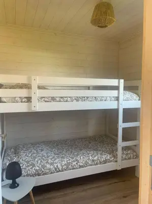 Un ou plusieurs lits dans un hébergement de l'établissement Chalet - Cottage de Lesconil