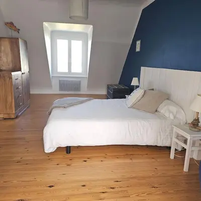 Un ou plusieurs lits dans un hébergement de l'établissement Charmante maison bretonne vue mer proche des plus belles plages
