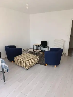 Coin salon dans l'établissement Appartement T4