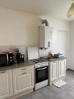 Cuisine ou kitchenette dans l'établissement Appartement T4