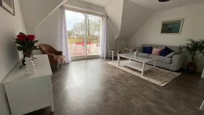 Coin salon dans l'établissement Très beau T3 proche plage