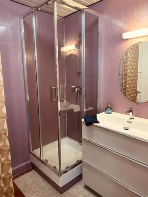 Salle de bains dans l'établissement L Appartement - Siam vue Capucins
