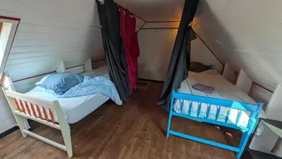 Un ou plusieurs lits dans un hébergement de l'établissement L'Ankou guest house