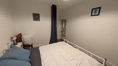 Un ou plusieurs lits dans un hébergement de l'établissement L'Ankou guest house