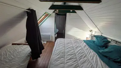 Un ou plusieurs lits dans un hébergement de l'établissement L'Ankou guest house