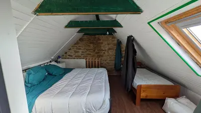 Un ou plusieurs lits dans un hébergement de l'établissement L'Ankou guest house