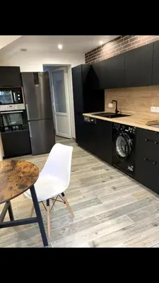 Cuisine ou kitchenette dans l'établissement Centre Quimper, animaux déclarés acceptés