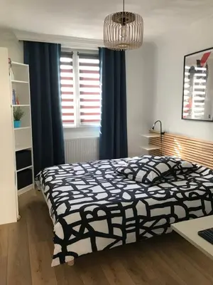 Un ou plusieurs lits dans un hébergement de l'établissement Bel Appartement familial classé proche tram place de Strasbourg accès centre ville, plages