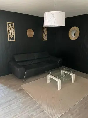 Coin salon dans l'établissement Chambre proche commerce et université 1