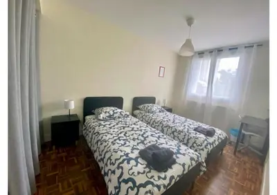 Un ou plusieurs lits dans un hébergement de l'établissement Beau T3 proche du centre, 2 ch, 3 lits
