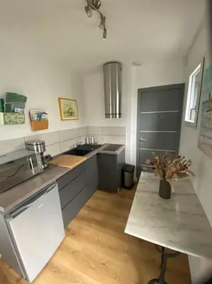 Cuisine ou kitchenette dans l'établissement Logement entier tout confort dans maison neuve