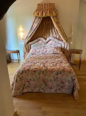 Un ou plusieurs lits dans un hébergement de l'établissement Le Gîte du Château Kervolongar
