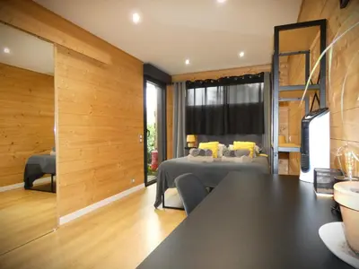 Coin salon dans l'établissement Cottage chaleureux avec Sauna & Jacuzzi
