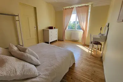 Un ou plusieurs lits dans un hébergement de l'établissement L'ESCAPADE BIGOUDENE - maison 300m de la plage