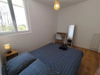 Un ou plusieurs lits dans un hébergement de l'établissement Le Pic vert By Nid'Ouest 3 Chambres