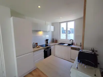 Cuisine ou kitchenette dans l'établissement Le Pic vert By Nid'Ouest 3 Chambres