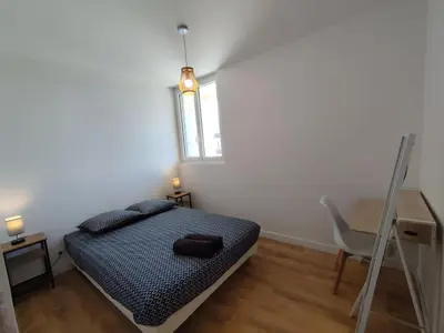 Un ou plusieurs lits dans un hébergement de l'établissement Le Pic vert By Nid'Ouest 3 Chambres