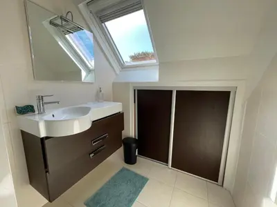 Salle de bains dans l'établissement Maison Mboa