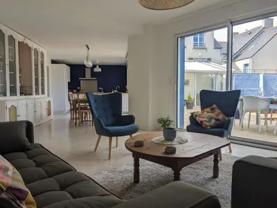 Coin salon dans l'établissement Ty glaz- Piscine privé chauffé securisé -Plage 700m