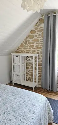 Un ou plusieurs lits dans un hébergement de l'établissement Jolie maison avec vue mer imprenable proche plage