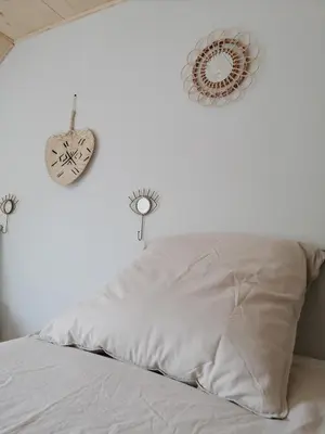 Un ou plusieurs lits dans un hébergement de l'établissement Chalets de pont cob avec spa