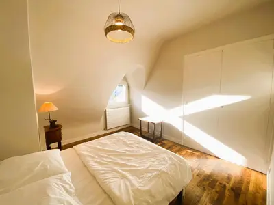 Un ou plusieurs lits dans un hébergement de l'établissement Bénodet, superbe maison 5 chambres à 150 m de la plage et restaurants
