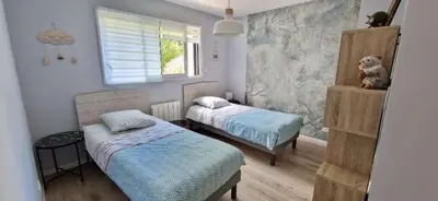 Un ou plusieurs lits dans un hébergement de l'établissement Villa des Abers vue mer, GR34, piscine chauffée