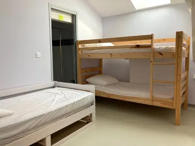 Un ou plusieurs lits dans un hébergement de l'établissement Ostal Scrignac - Gîte d'étape de la Gare