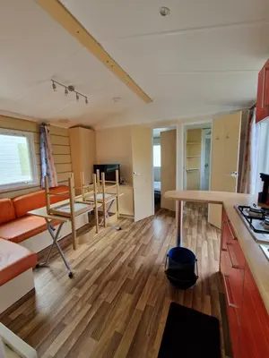 Coin salon dans l'établissement Mobil home plouescat