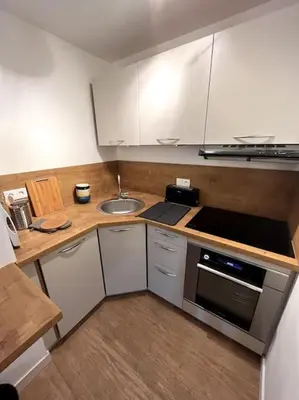 Cuisine ou kitchenette dans l'établissement T2 au coeur du centre ville
