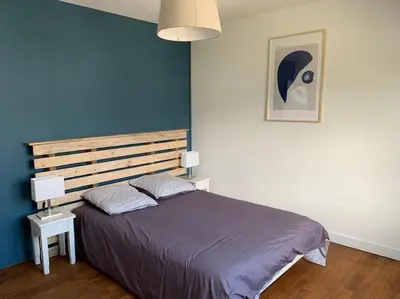 Un ou plusieurs lits dans un hébergement de l'établissement Ty Reuz - Maison avec 40 m2 de terrasse vue mer à Morgat