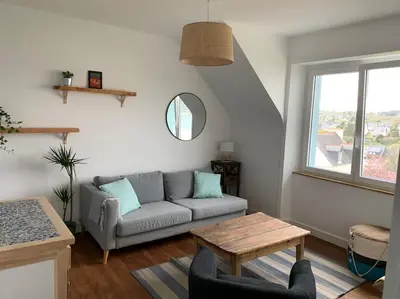Coin salon dans l'établissement Ty Reuz - Maison avec 40 m2 de terrasse vue mer à Morgat