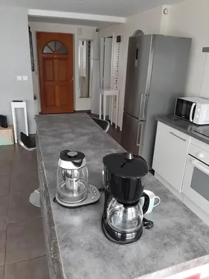 Cuisine ou kitchenette dans l'établissement Appart cosy aux écluses du port