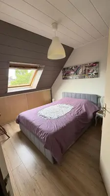 Un ou plusieurs lits dans un hébergement de l'établissement Un ptit coin de paradis chez JF et Daisy à Plouescat