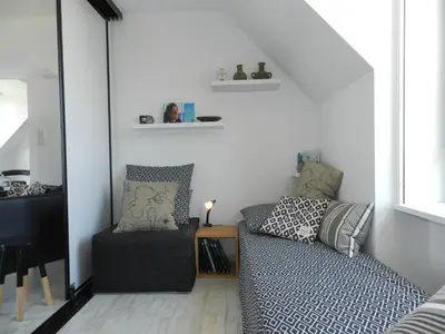 Coin salon dans l'établissement Holiday Home Le Ménez by Interhome