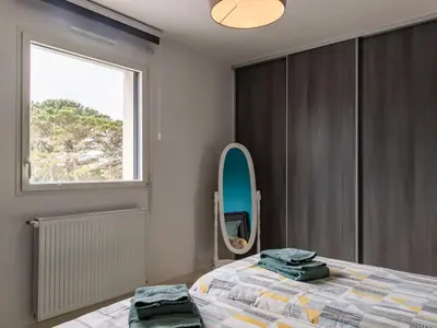 Un ou plusieurs lits dans un hébergement de l'établissement Holiday Home La Villa du Pêcheur by Interhome