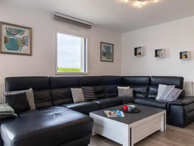 Coin salon dans l'établissement Holiday Home La Villa du Pêcheur by Interhome
