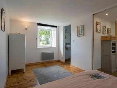 Un ou plusieurs lits dans un hébergement de l'établissement Holiday Home Ty Louen by Interhome