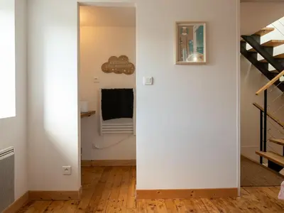 Télévision ou salle de divertissement dans l'établissement Holiday Home Ty Louen by Interhome