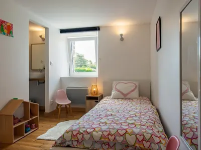 Un ou plusieurs lits dans un hébergement de l'établissement Holiday Home Ty Louen by Interhome