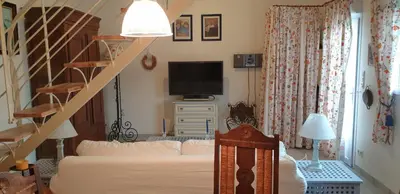 Un ou plusieurs lits dans un hébergement de l'établissement Kleines Ferienhaus am Meer