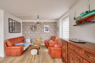 Coin salon dans l'établissement Maison pour 6, port et plage de Lesconil