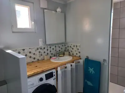 Cuisine ou kitchenette dans l'établissement Studio bois indépendant au calme