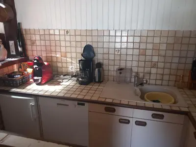 Cuisine ou kitchenette dans l'établissement Molène