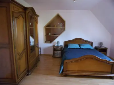Un ou plusieurs lits dans un hébergement de l'établissement MAISON à la campagne à LENNON