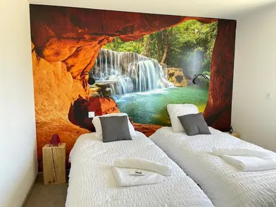 Un ou plusieurs lits dans un hébergement de l'établissement Villa Noz Vat 4 étoiles avec SPA