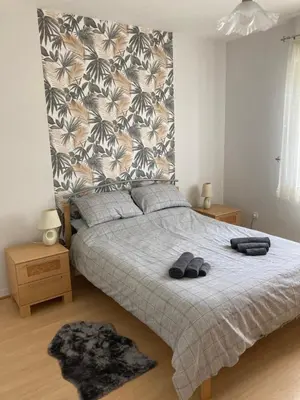 Un ou plusieurs lits dans un hébergement de l'établissement Cheerful two bedroom house PLONEVEZ du Faou