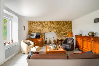 Coin salon dans l'établissement Plages La Torche et du Ster - Maison pour 6- Surf